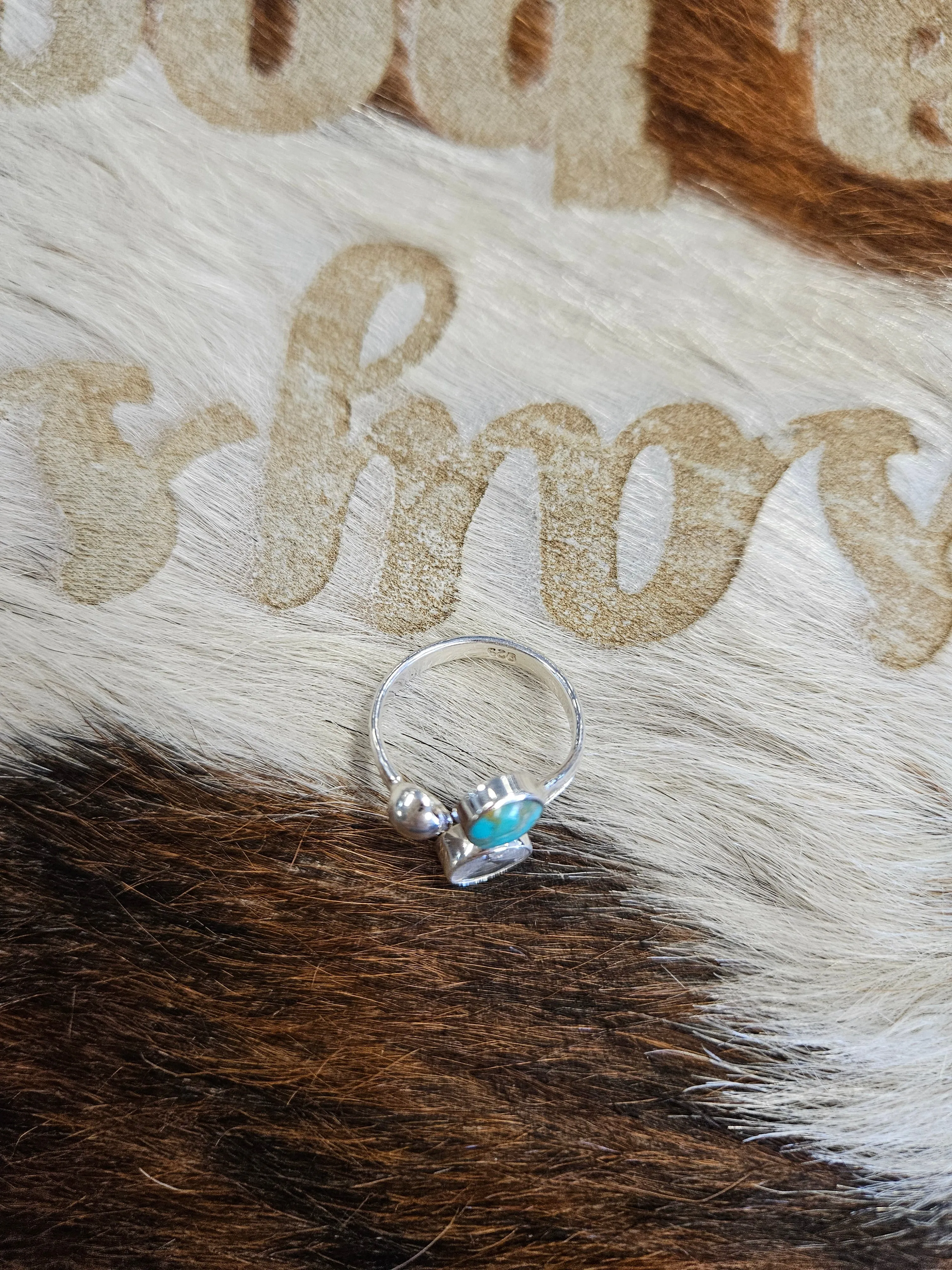 TURQUOISE OVAL CLUSTER RING